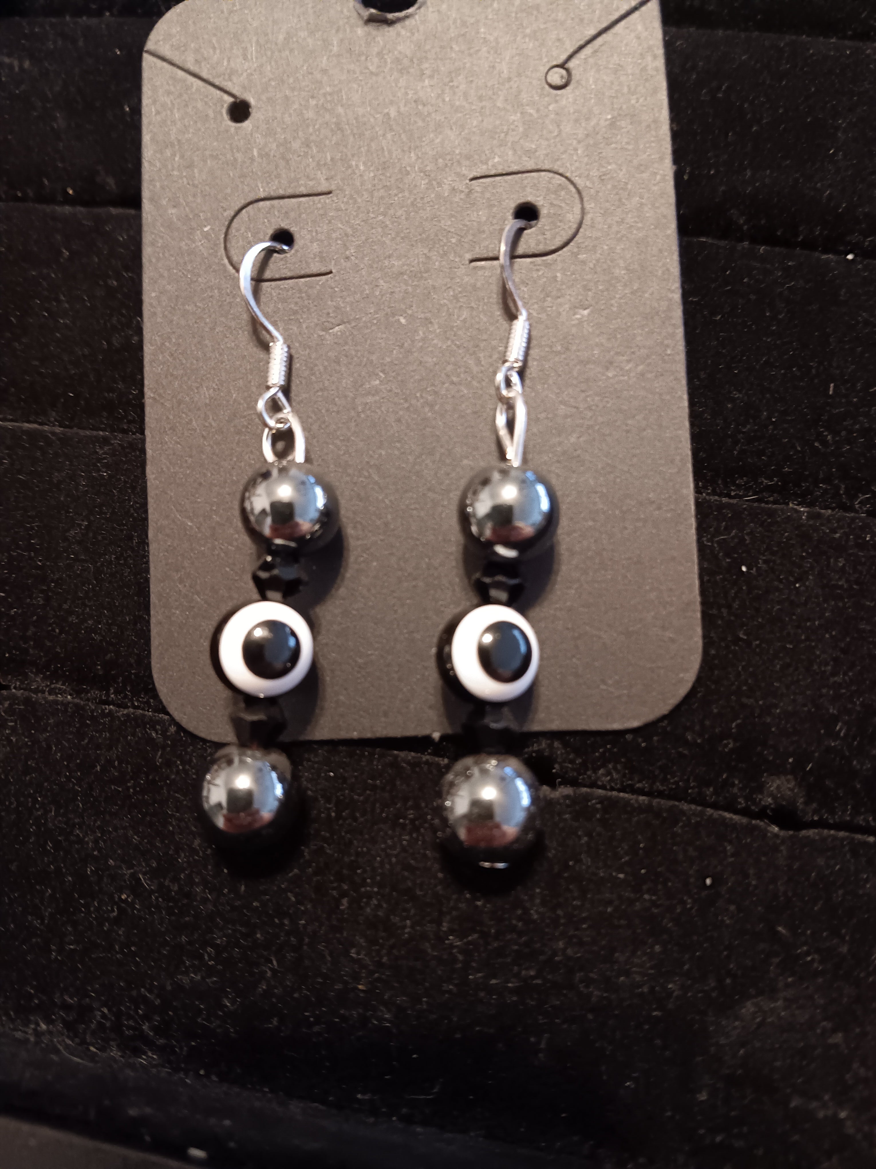 Genuine Hematite evil eye dangles
