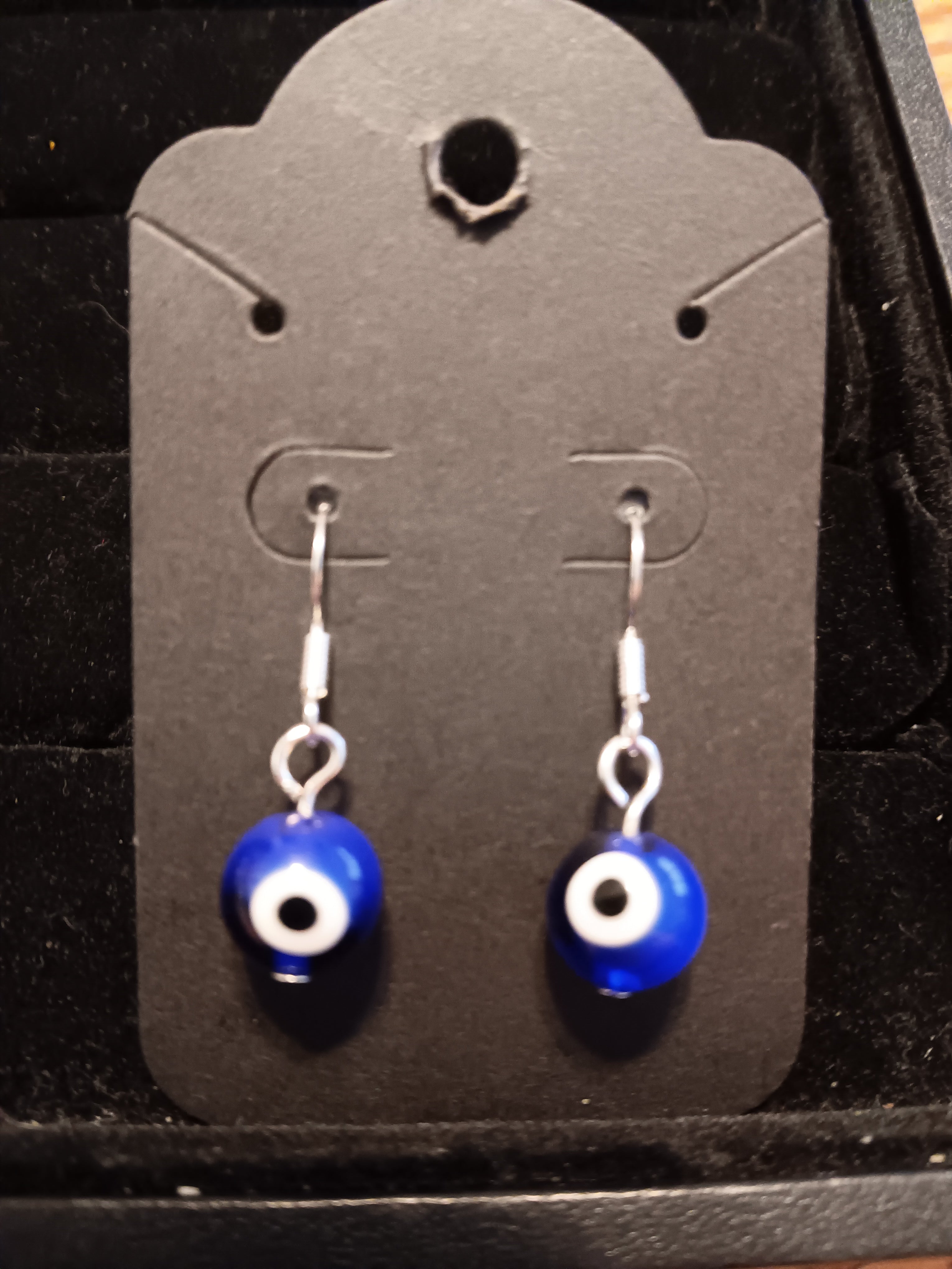 Evil eye short dangle earrings