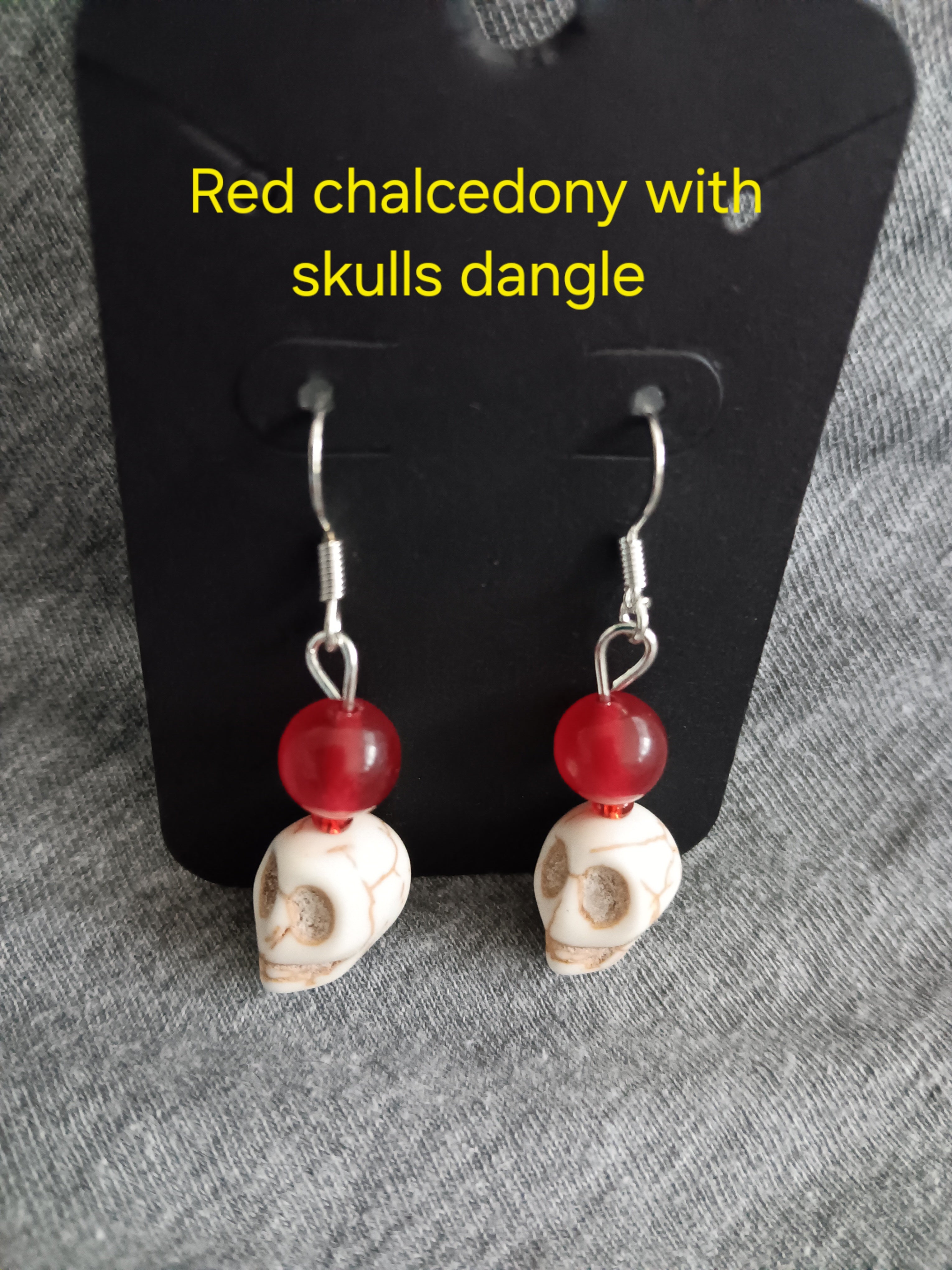 Genuine crystal w skull dangle earrings