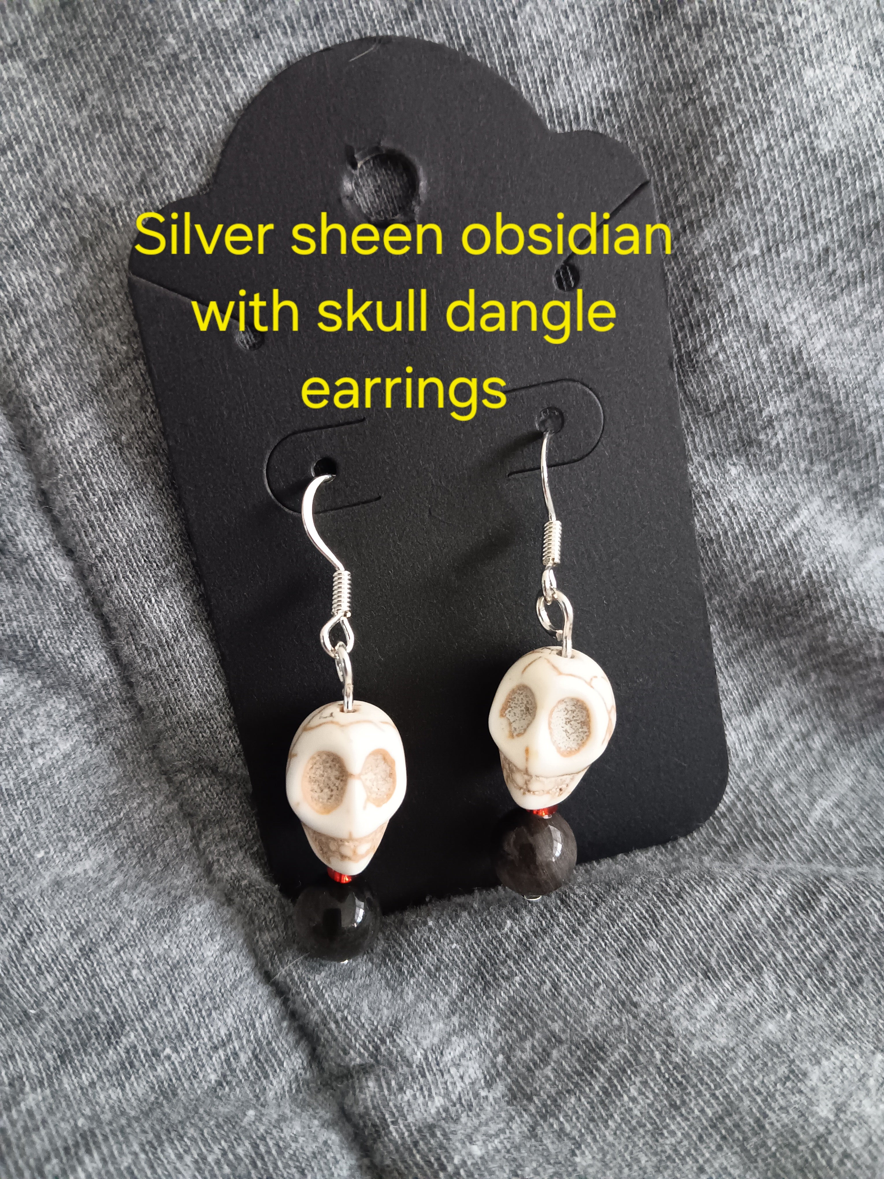 Genuine crystal w skull dangle earrings