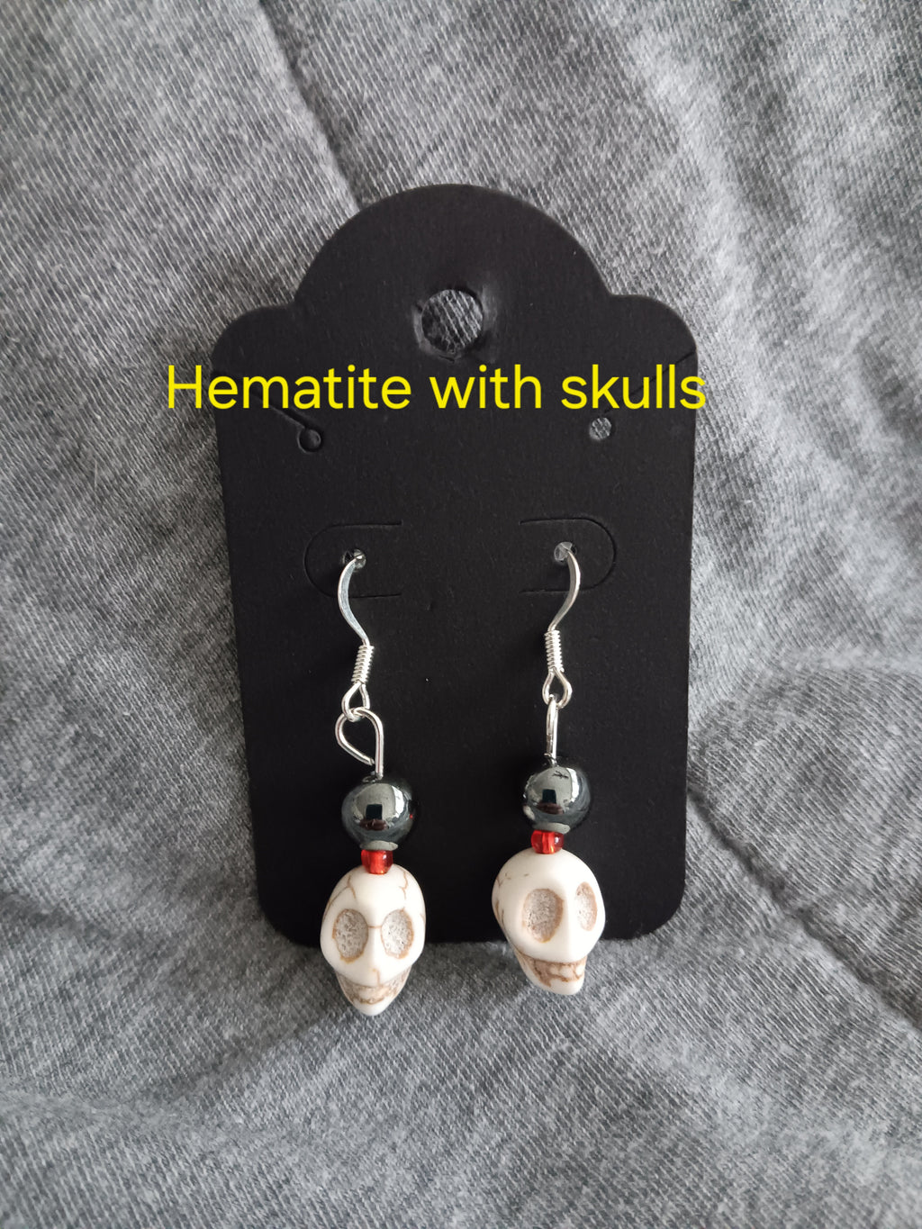 Genuine crystal w skull dangle earrings