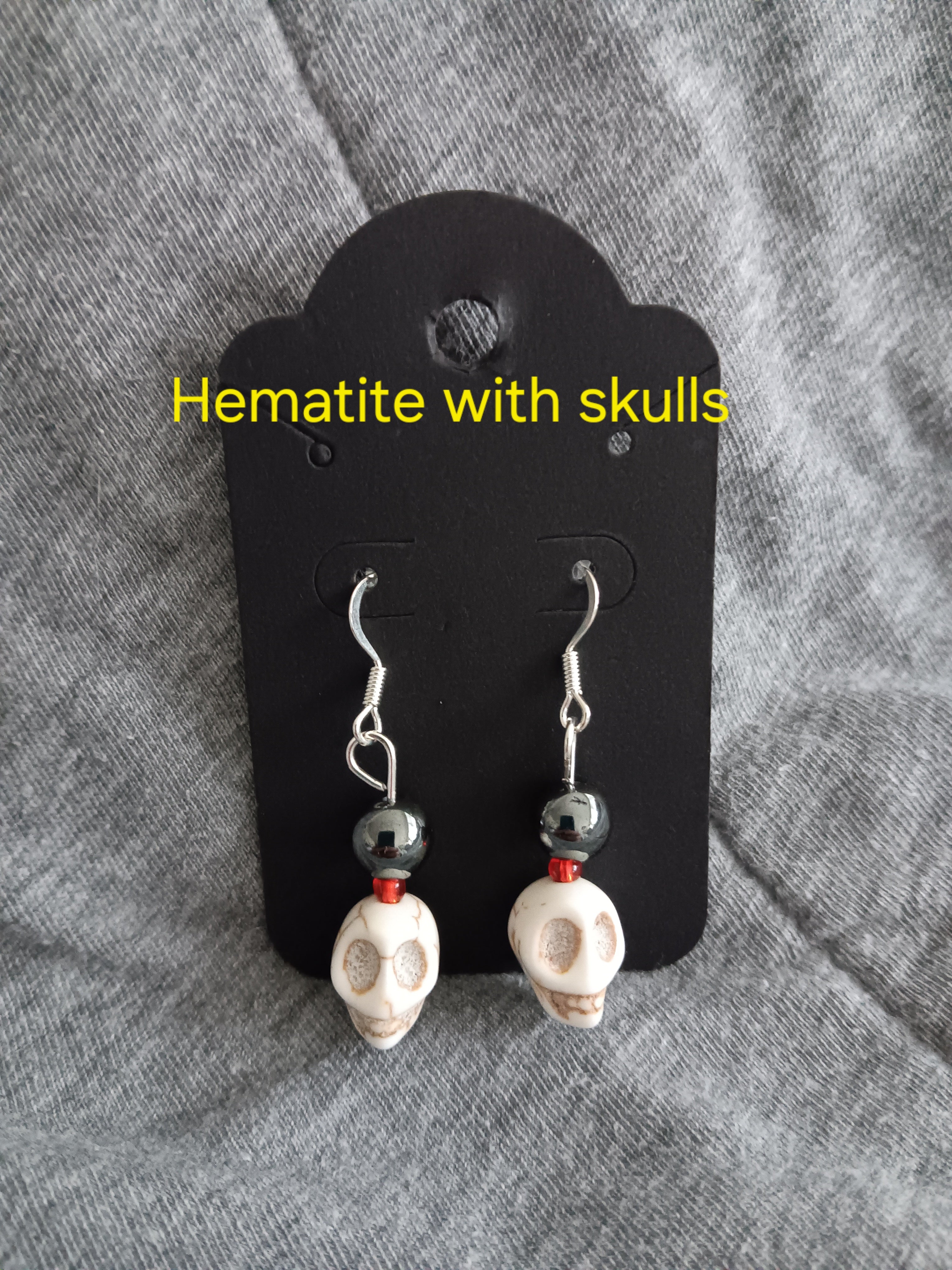 Genuine crystal w skull dangle earrings