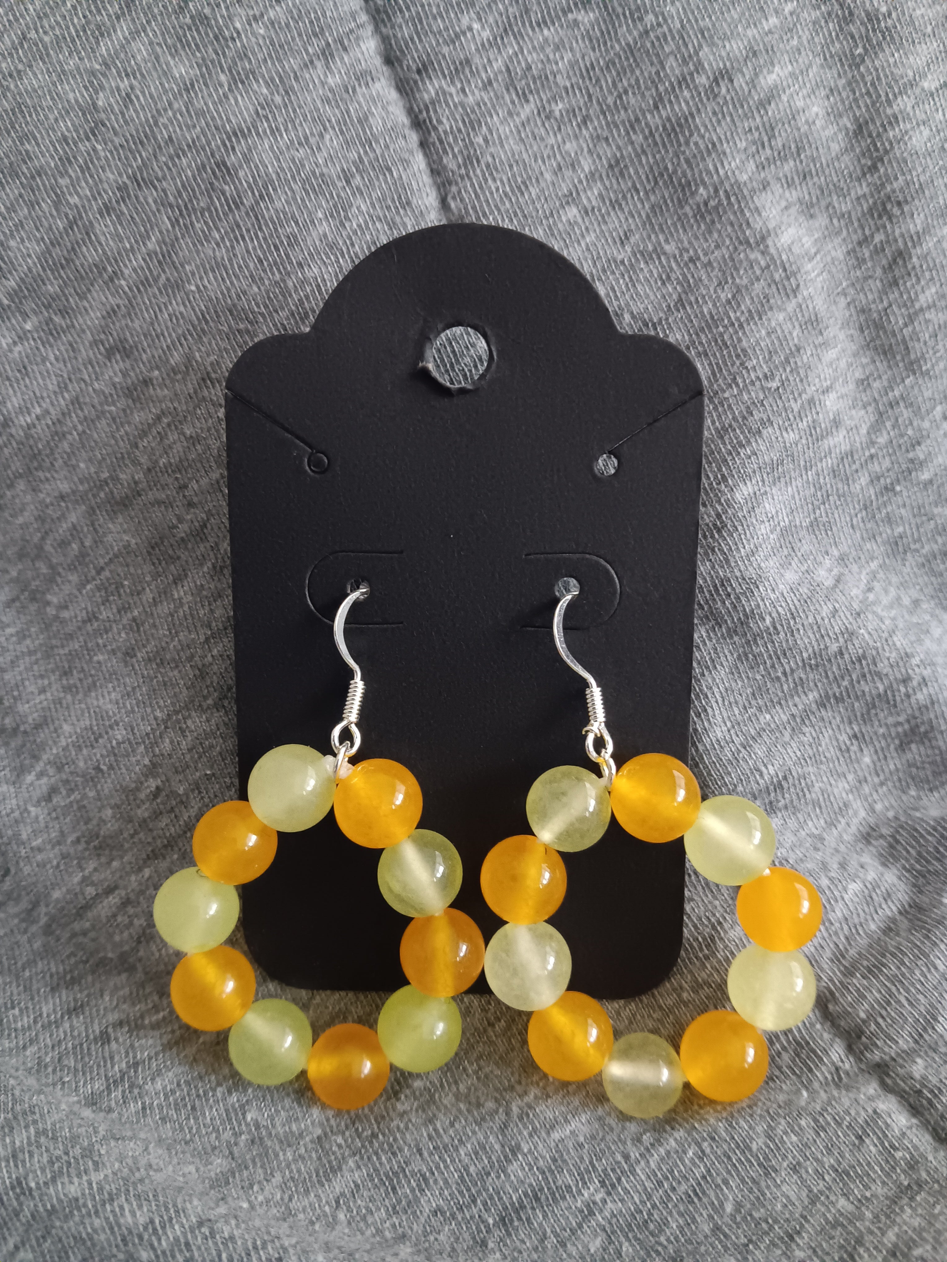 Genuine dark and light yellow chalcedony dangle hoops