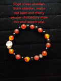 Black obsidian, silver sheen obsidian, matte red jasper and cherry pepper chalcedony skull bracelet