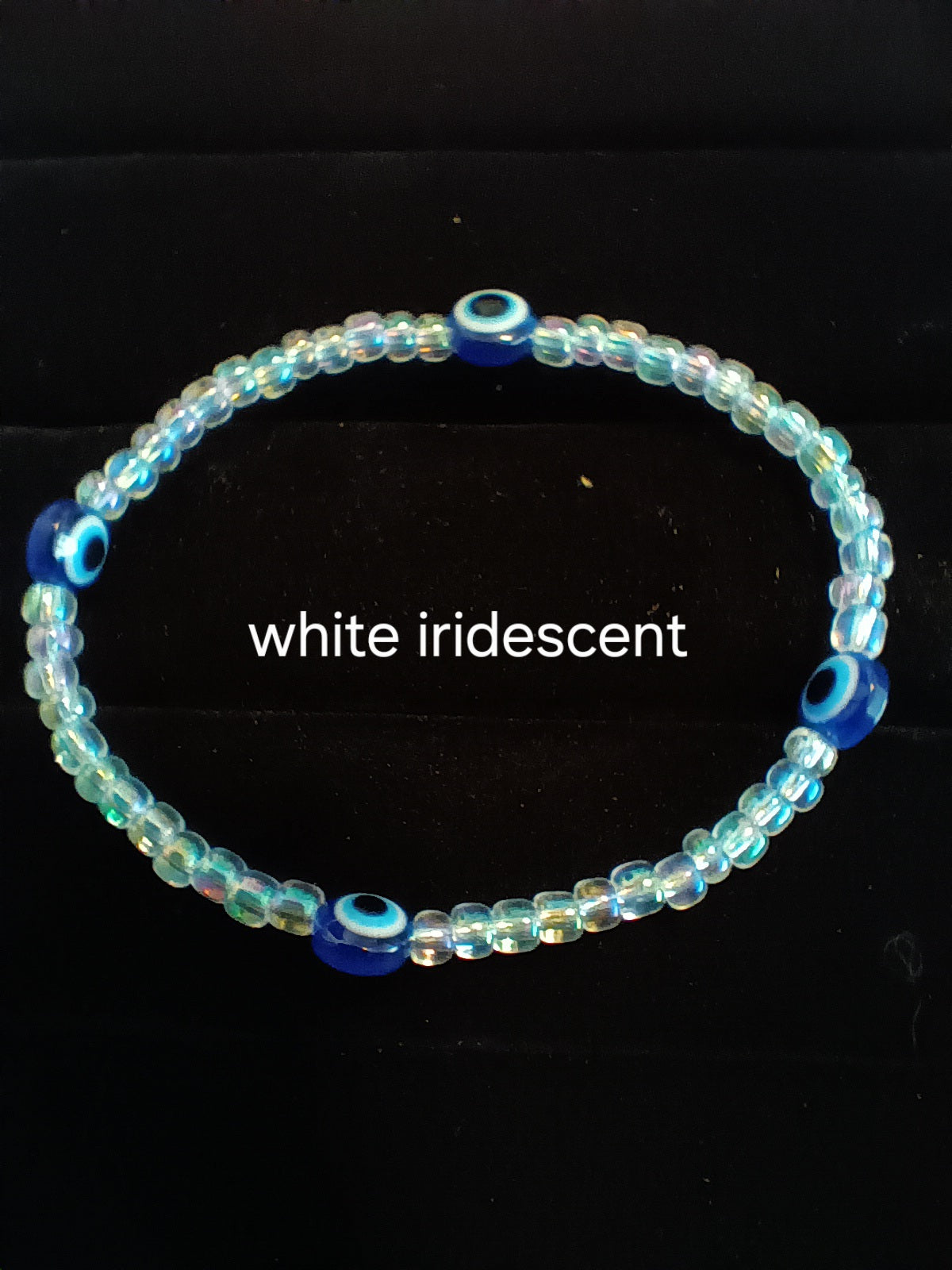 Single strand evil eye stretch bracelet