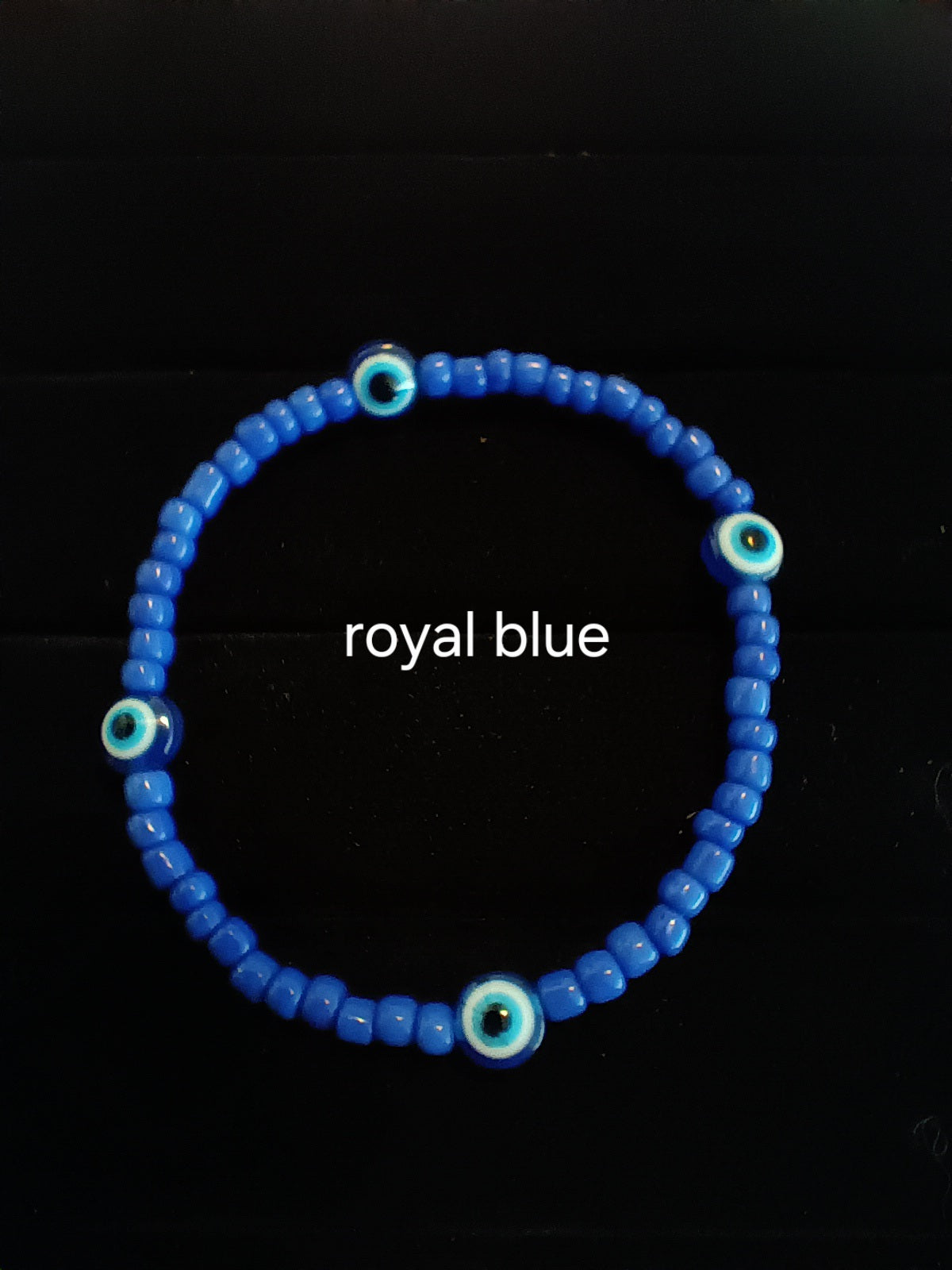 Single strand evil eye stretch bracelet