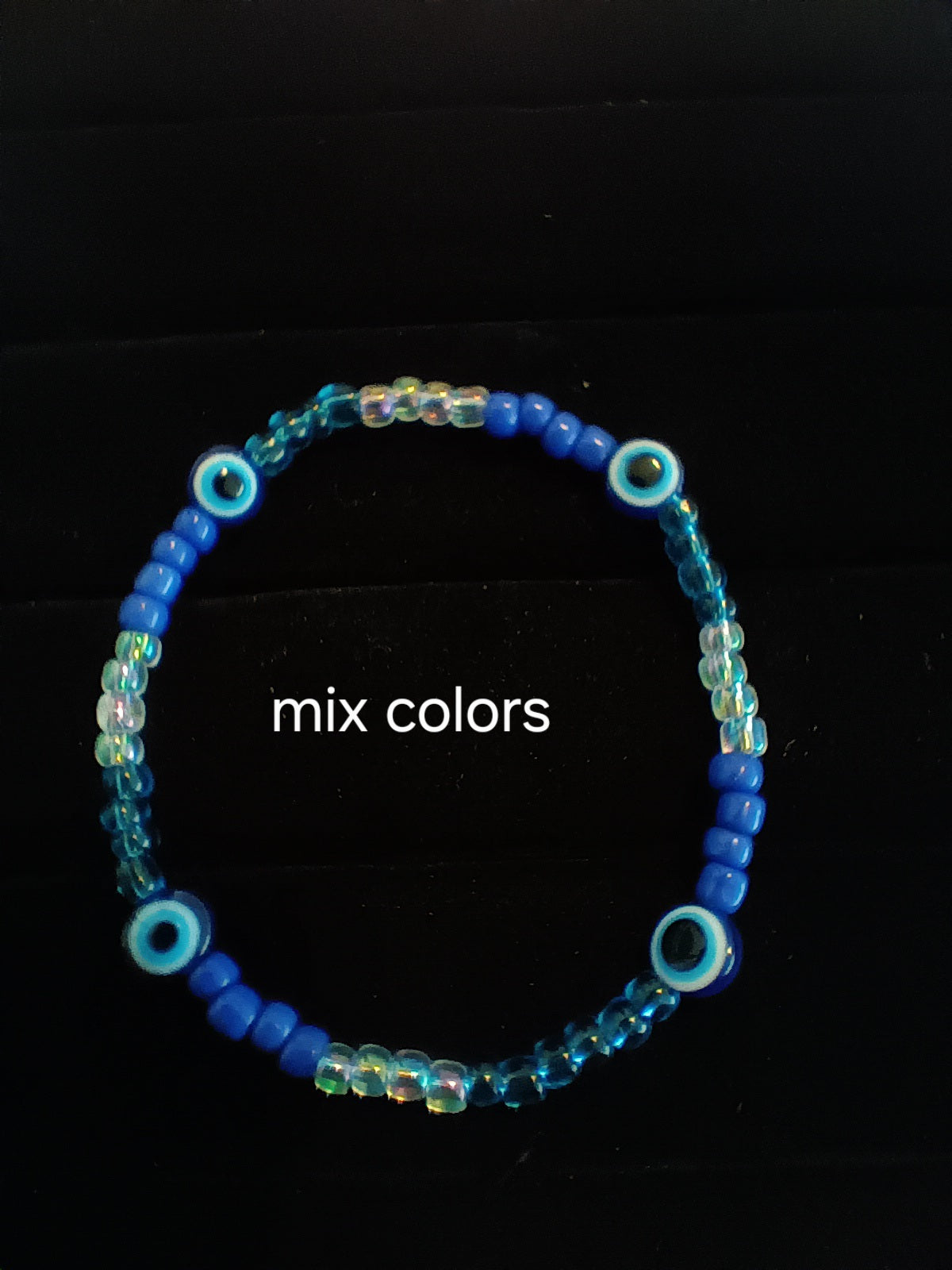 Single strand evil eye stretch bracelet