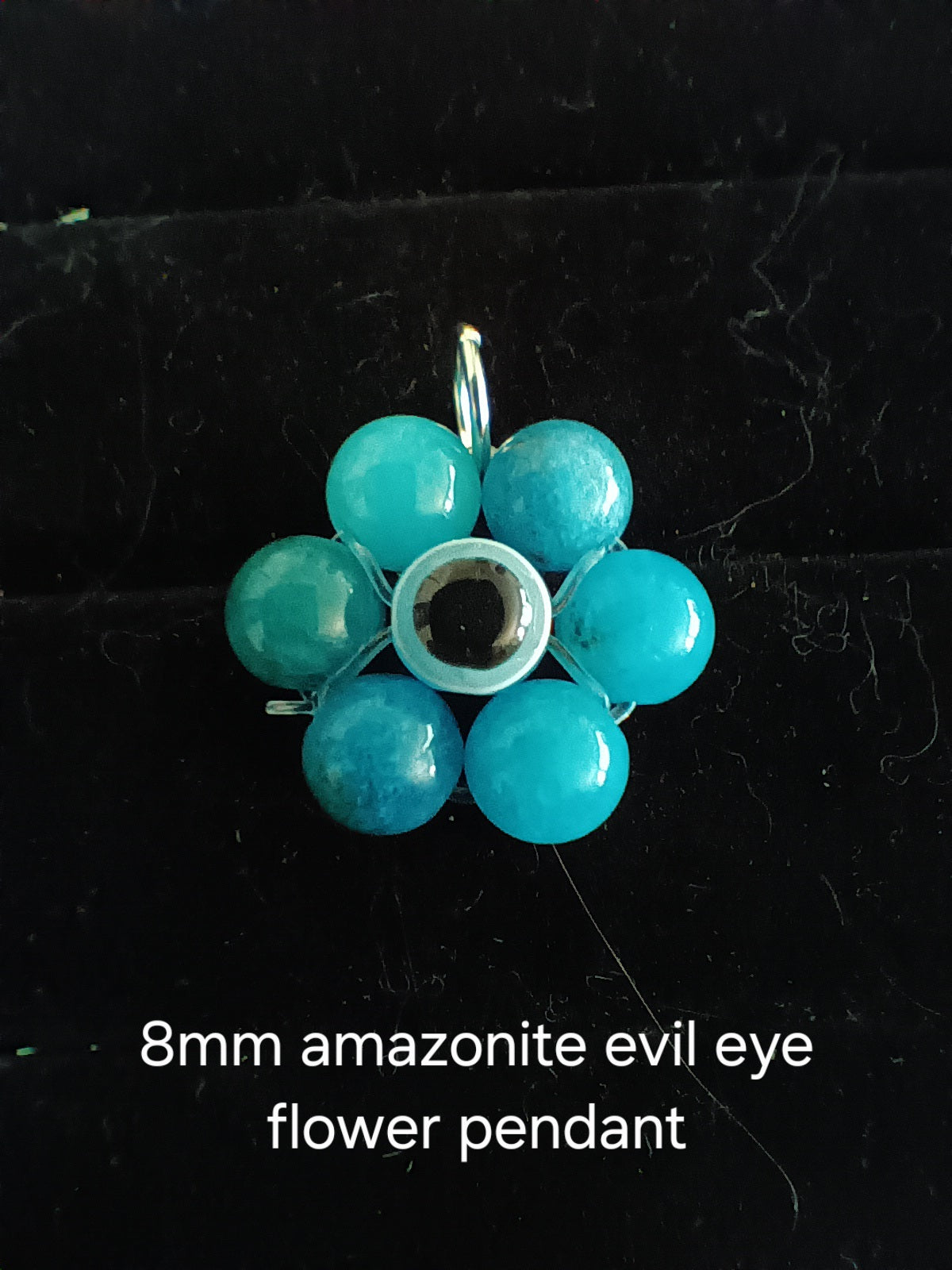 Genuine crystal evil eye flower pendant