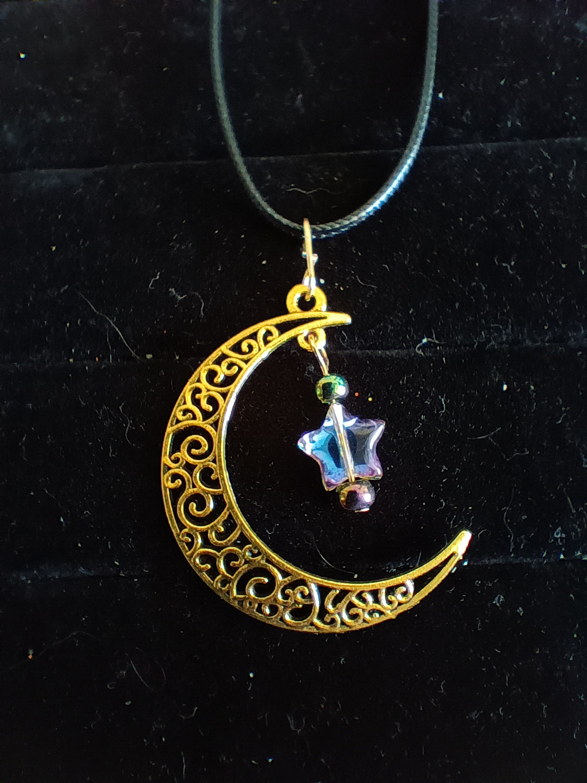 Crescent moon pendant with dangle