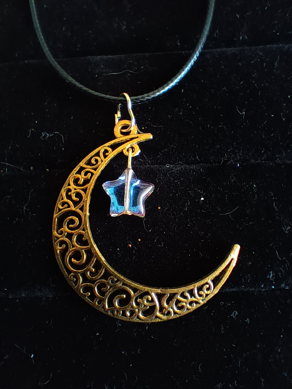 Crescent moon pendant with dangle